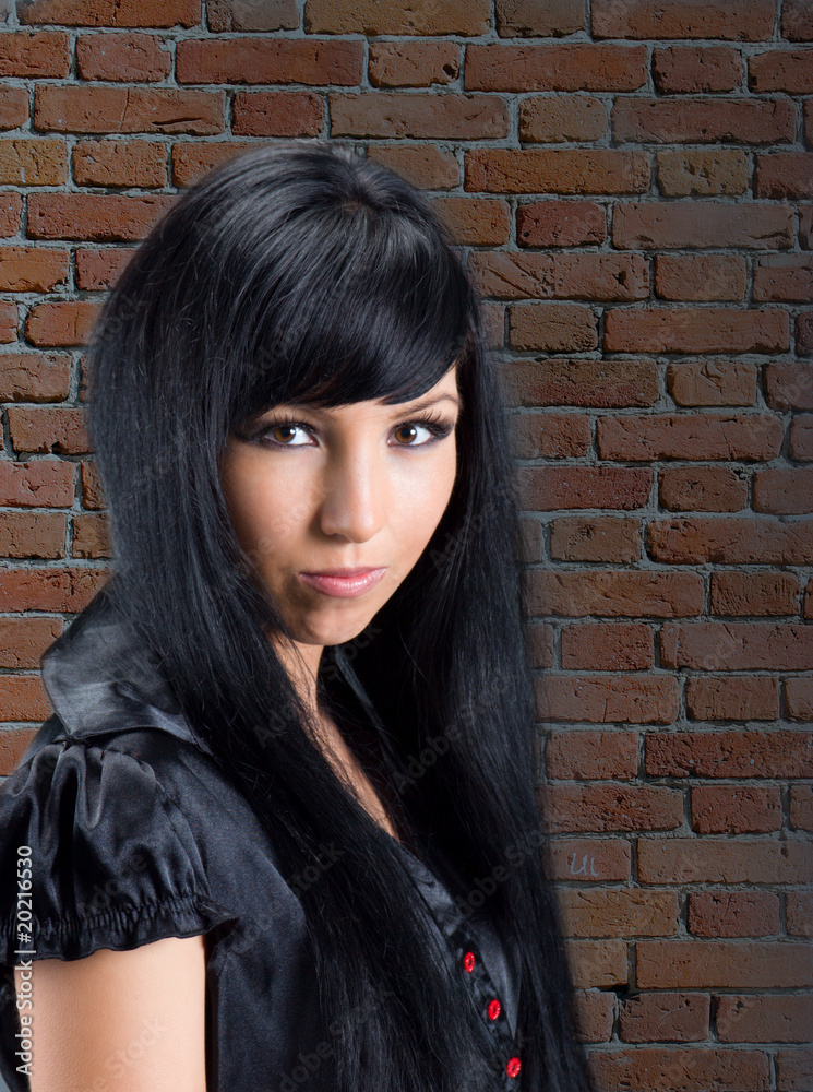 enigmatic brunette girl on grunge background enigmatic brunette girl on grunge background