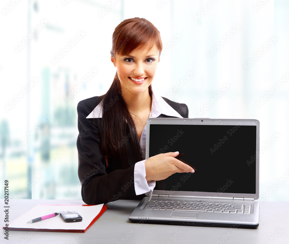 Businesswoman working at desk, isolated on white.. Businesswoman working at desk, isolated on white..