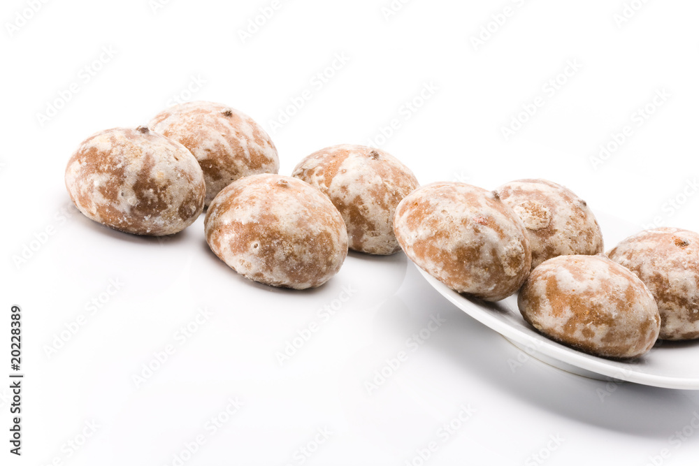 Pile of honey-cakes over white background