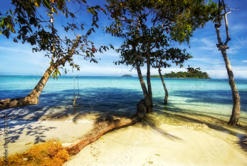 Tropical beach under blue sky. Thailand