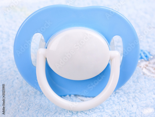 Blue pacifier, close-up