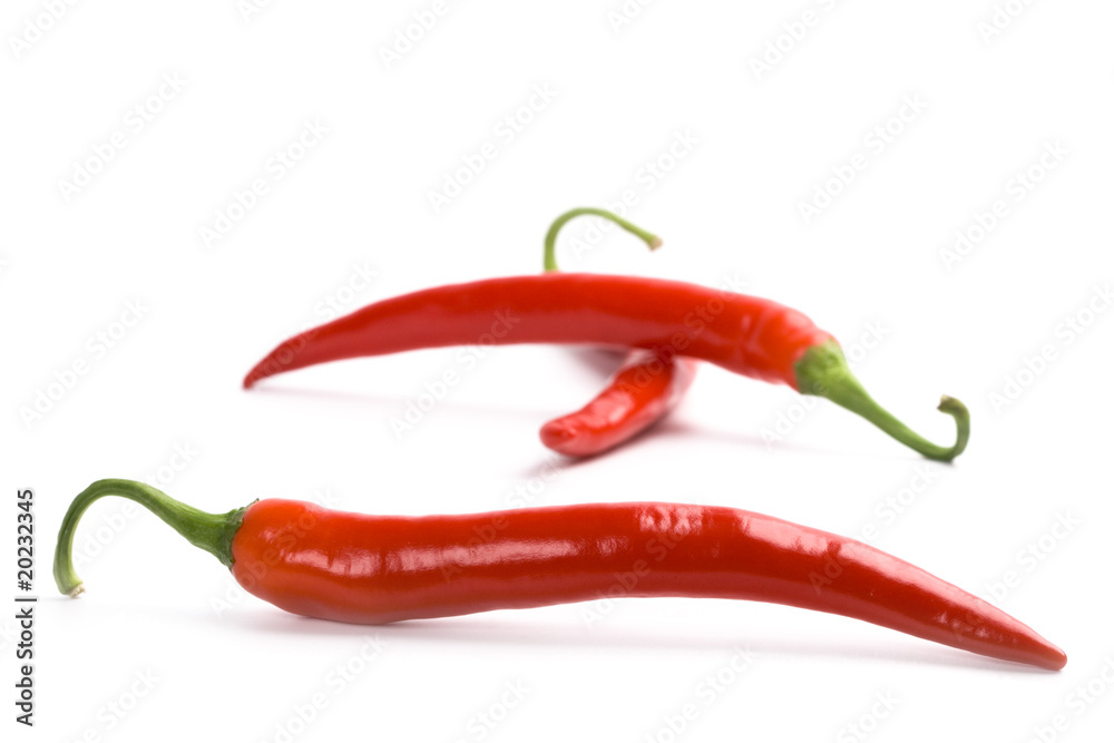 three red chili peppers