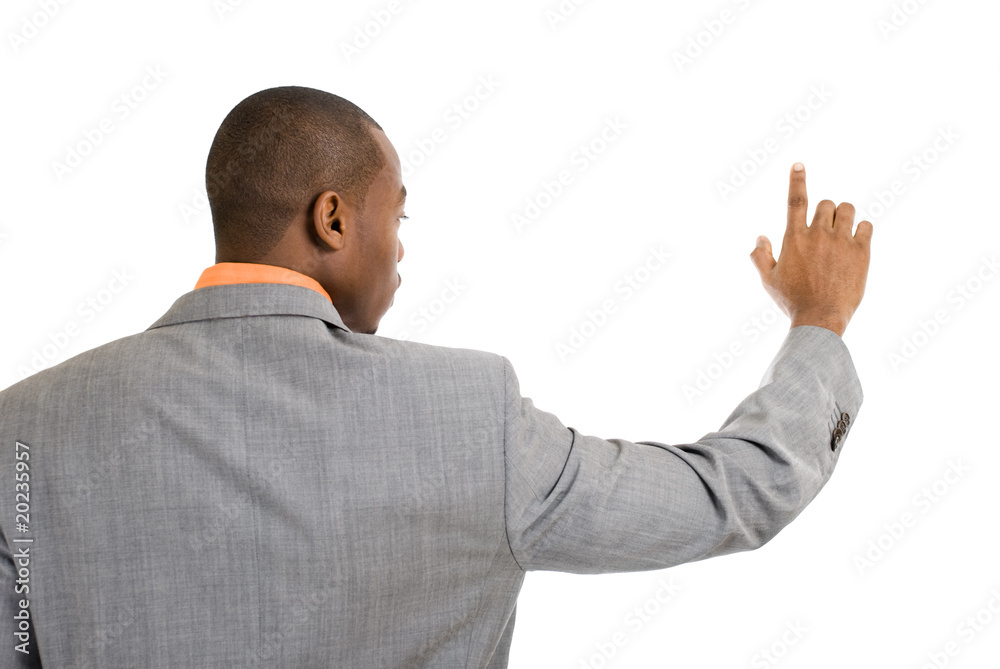 African american business man pointing into copyspace