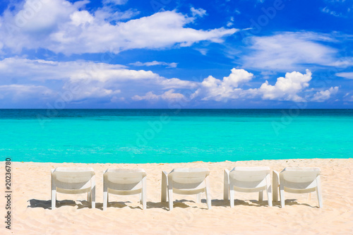 Chairs on tropical beach