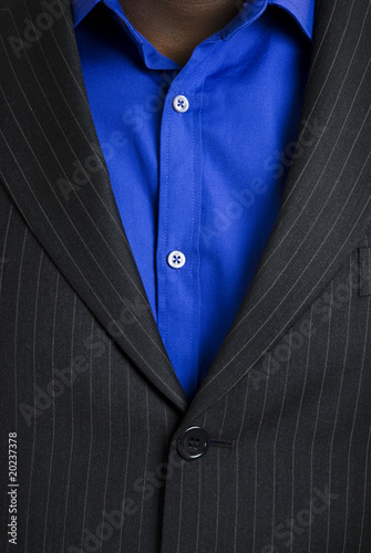 Business suit with blue shirt