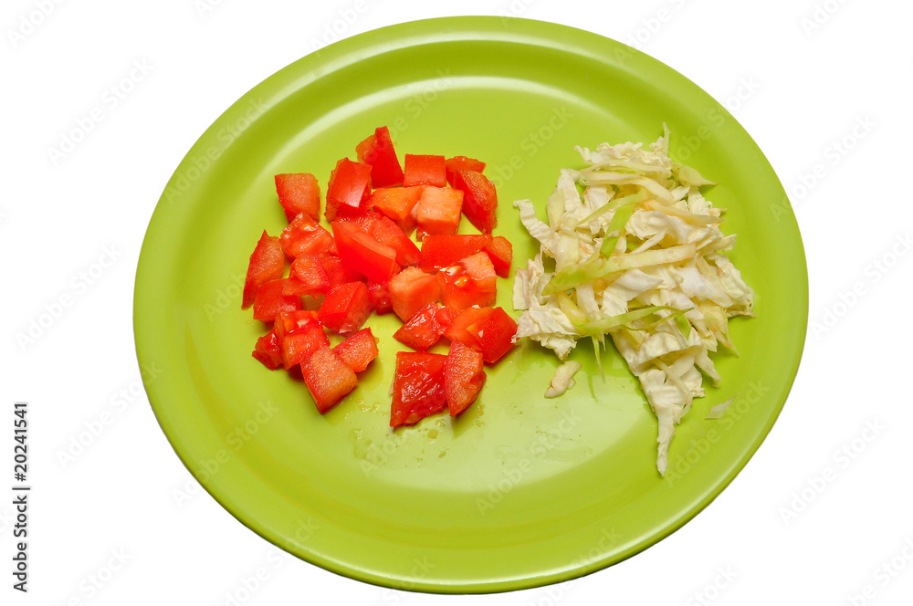 Sliced tomatoes on a plate top view Sliced tomatoes on a plate top view