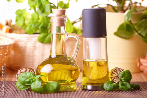 Two bottles with olive oil and grape seed oil