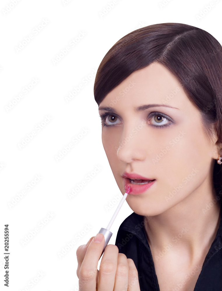 picture of beautiful woman applying lipstick using lips brush picture of beautiful woman applying lipstick using lips brush