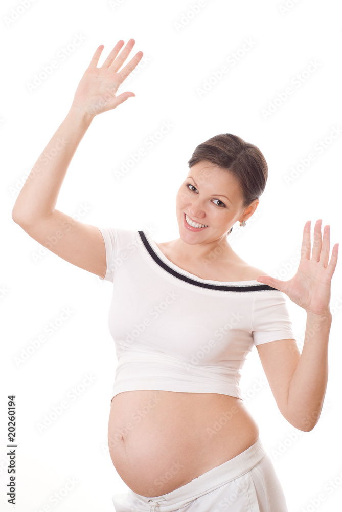 pregnant gesturing a success sign isolated on white pregnant gesturing a success sign isolated on white