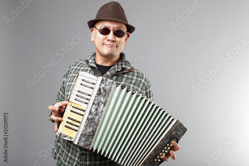 Man playing a French accordion