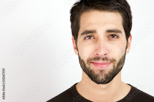 A Happy Young Man looking at the camera caucasian