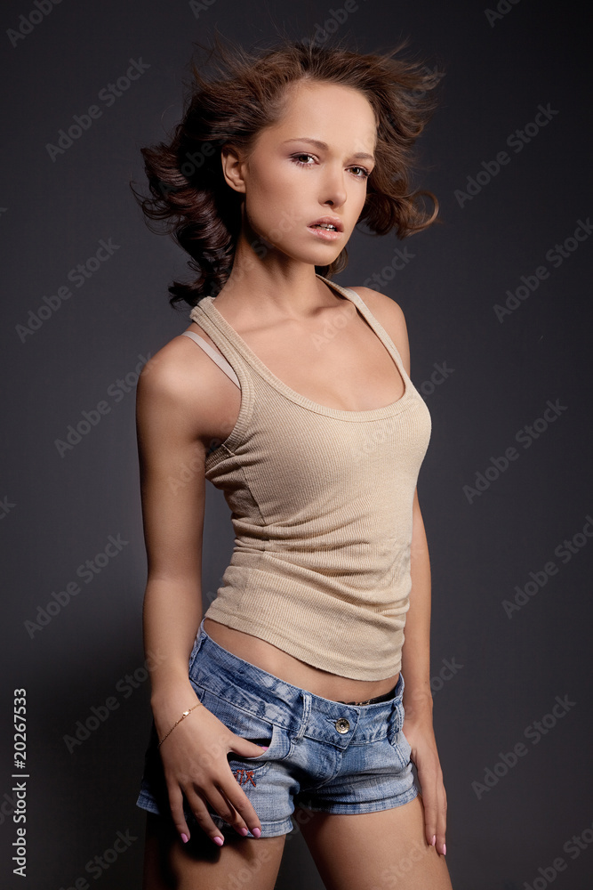 Young pretty lady posing in jeans Young pretty lady posing in jeans