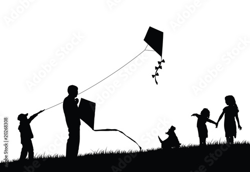 Family flying kite