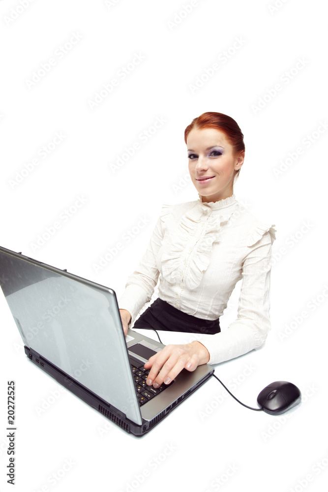 Business woman working on her laptop. Business woman working on her laptop.