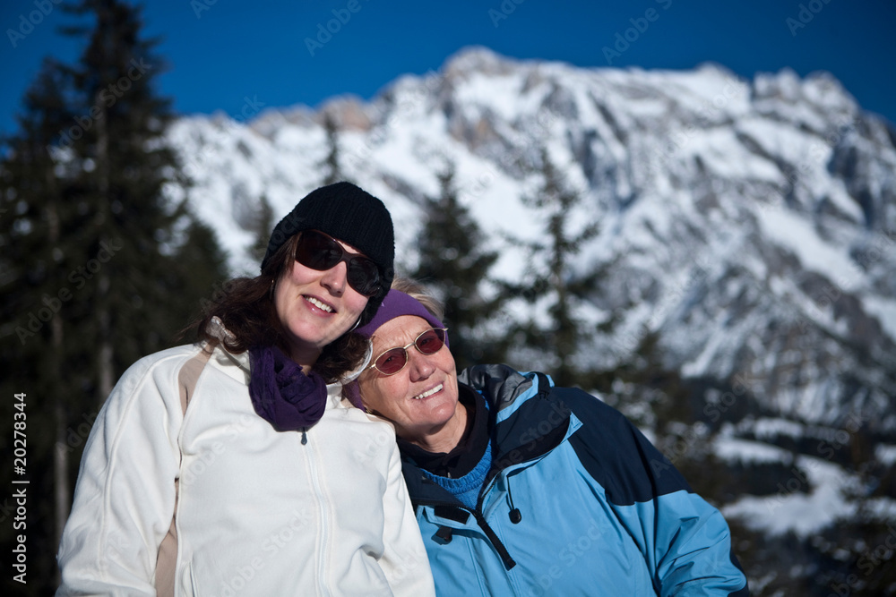 Mother and daughter in winter Mother and daughter in winter