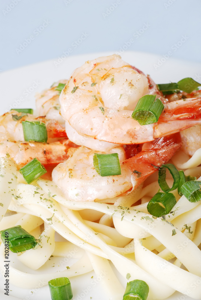 top view shrimp with spring onions and noodles shallow dof top view shrimp with spring onions and noodles shallow dof