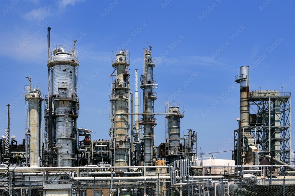 Oil industry installation, metal skyline blue sky Oil industry installation, metal skyline blue sky