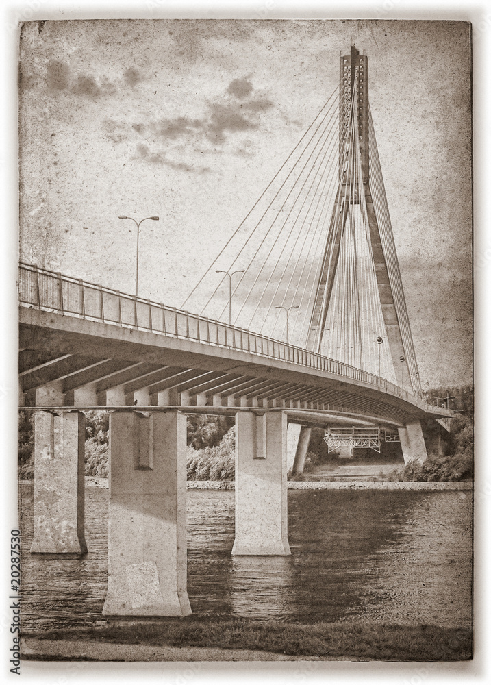 Naklejka premium Swietokrzyski bridge on Vistula river in Warsaw, Poland.
