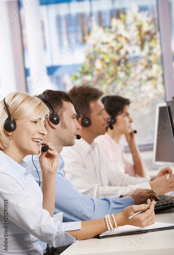 Customer service operators in a row