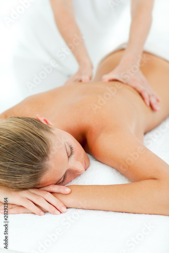 Jolly woman enjoying a massage