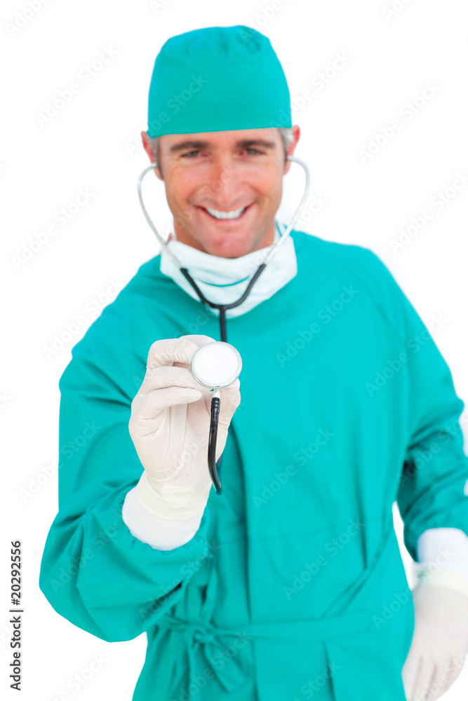 Charismatic surgeon holding a stethoscope Charismatic surgeon holding a stethoscope