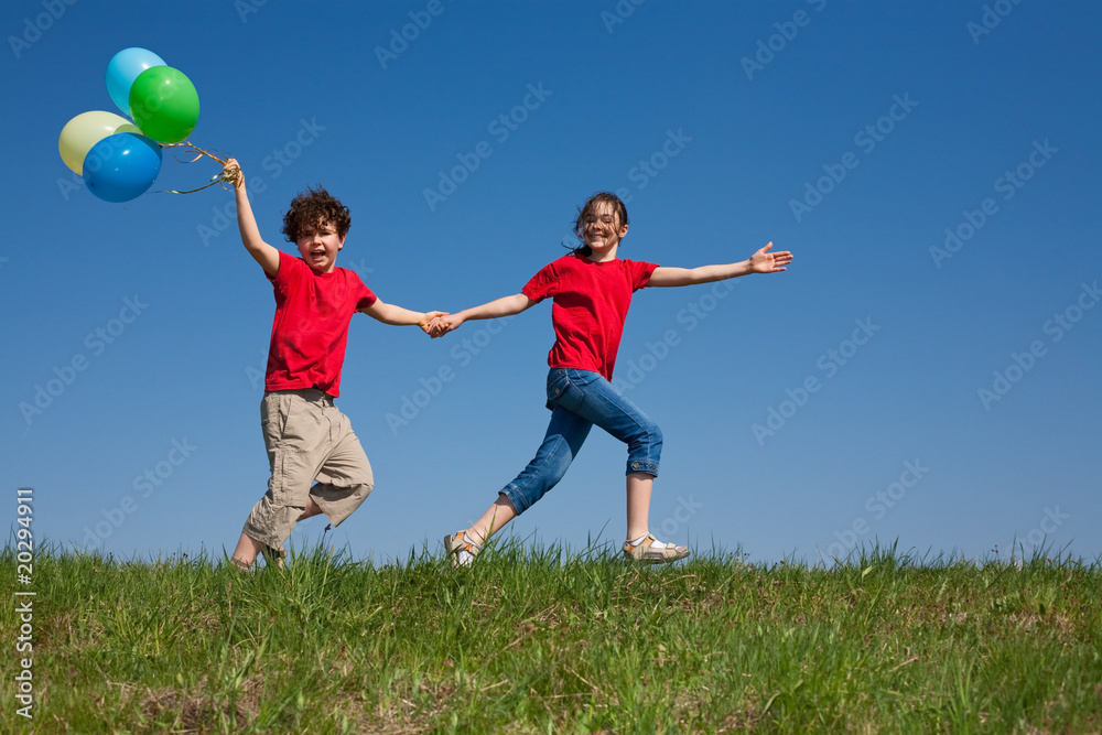 Girl and boy running, jumping outdoor Girl and boy running, jumping outdoor