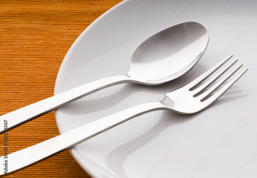 closeup of a place setting with dinner-plate closeup of a place setting with dinner-plate