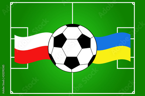 ball with waving flags of Poland and Ukraine on field background