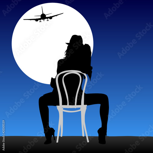woman looking plane in the moonlight