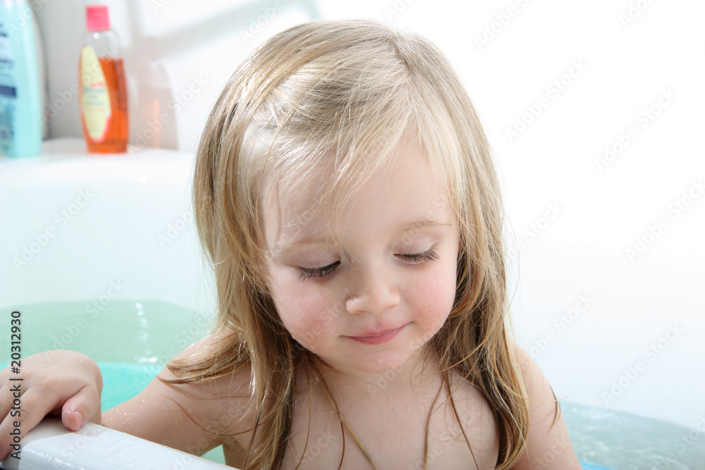 Baby in a bathtub Stock Photo | Adobe Stock