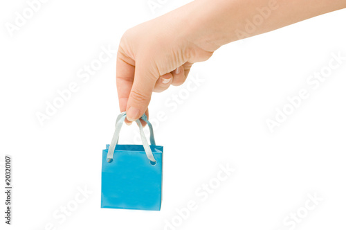 Dark blue bag in a female hand