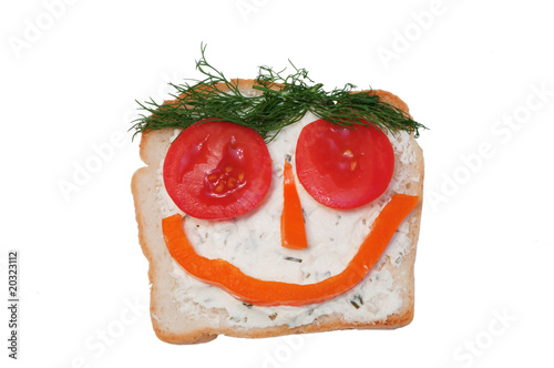 funny open sandwich with tomato, paprika and dill photo