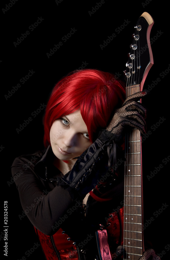 Obraz premium Sexy red haired girl with guitar