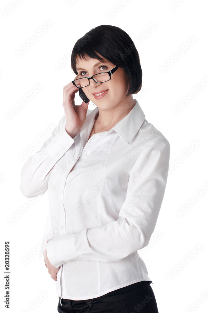 The charming young business woman in a white shirt The charming young business woman in a white shirt