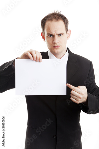 sad man with paper in office