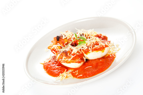stuffed eggs with tomato cheese