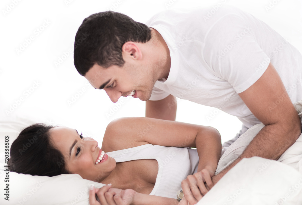 Loving affectionate couple in bed Loving affectionate couple in bed