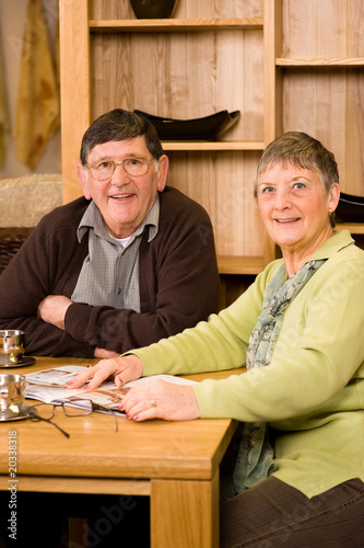 Senior couple sitting in dining room