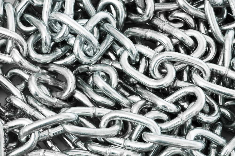 Long silver chain arranged as the background Long silver chain arranged as the background