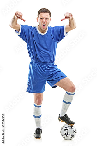 An angry soccer player shouting and giving thumbs down © Ljupco Smokovski