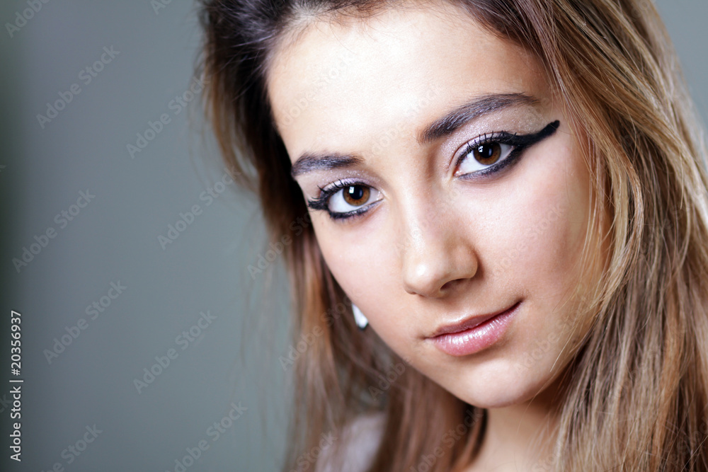 Portrait of the sad model with beautiful hair
