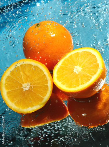 Fototapeta Naklejka Na Ścianę i Meble -  three fresh oranges