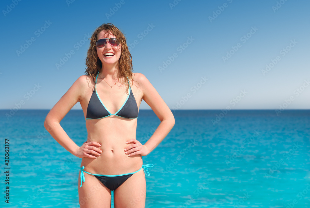 beautiful smiling woman against sea horizon beautiful smiling woman against sea horizon