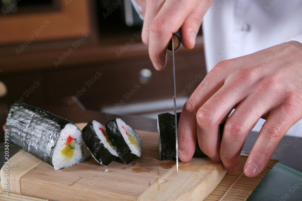 Obraz premium Chef Preparing Sushi