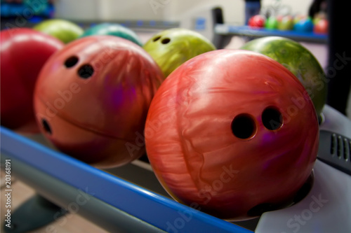 Bowling balls on a shelf photo