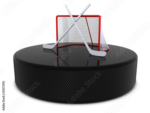 Hockey sticks and goal on the puck