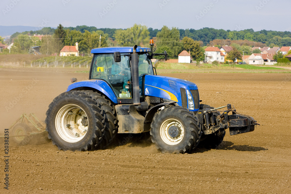 Fototapeta premium tractor on field, Czech Republic