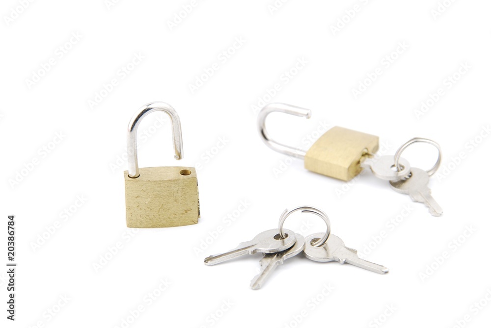 Two golden open padlock with keys on white Two golden open padlock with keys on white