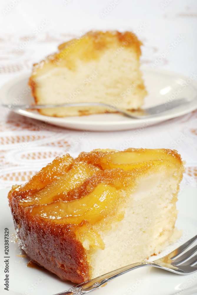 two slices of upside down pear cake
