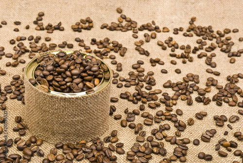 Coffee tin on sackcloth background
